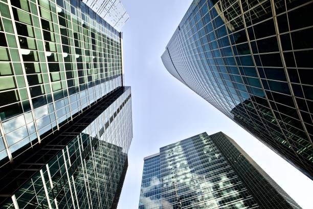 istock Office and residential skyscrapers on clear blue sky background. 1172987282