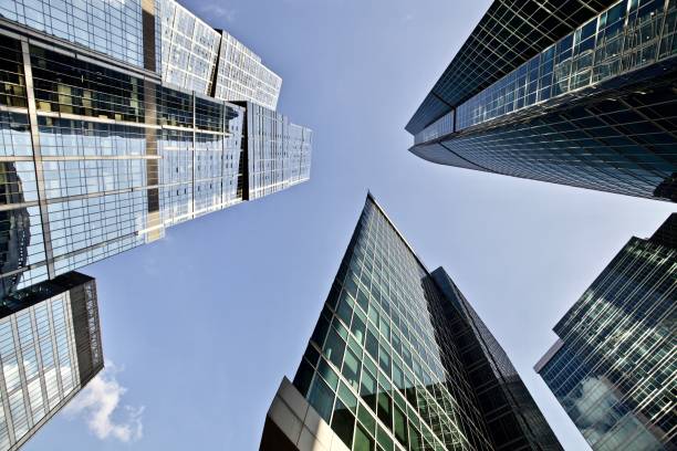 istock Office and residential skyscrapers on clear blue sky background. 1172987294
