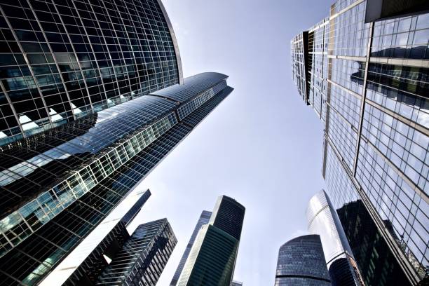 istock skyscrapers on bright sun and clear blue sky background 1172987804