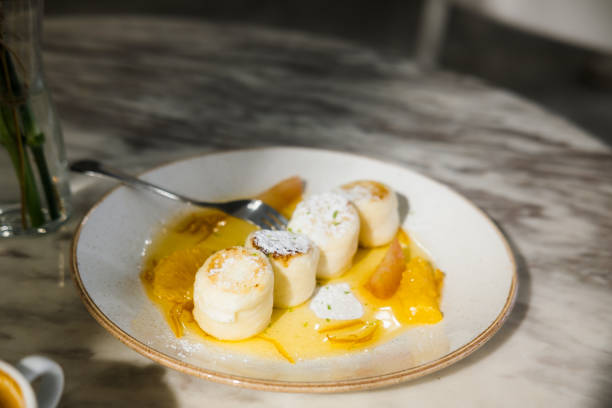 istock Cottage cheese pancakes with orange jam 1172990558