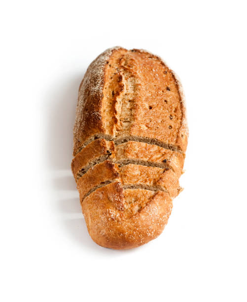 istock Loaf of whole wheat bread with slices isolated on white background 1173002938