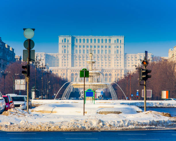 Bucharest city in winter. Parliament building Bucharest city in winter. Parliament building parliament palace in bucharest romania the largest building in europe stock pictures, royalty-free photos & images