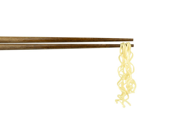 instant noodles chopsticks isolated on white background with clipping path