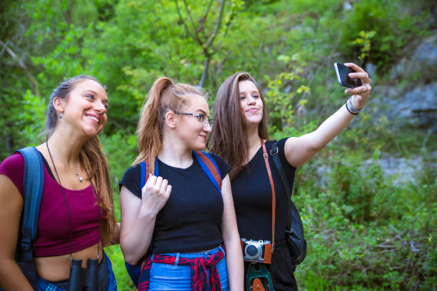 istock Women taking selfie in nature 1173006486