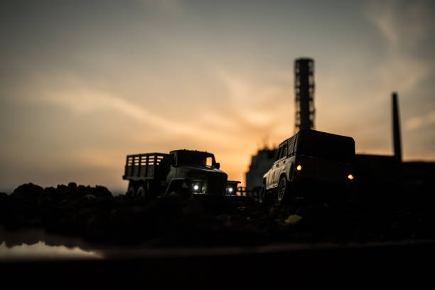 istock Creative artwork decoration. Chernobyl nuclear power plant at night. Layout of abandoned Chernobyl station after nuclear reactor explosion. 1173007901