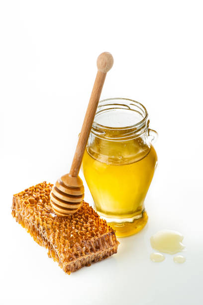 istock glass jar with acacia honey 1173009123