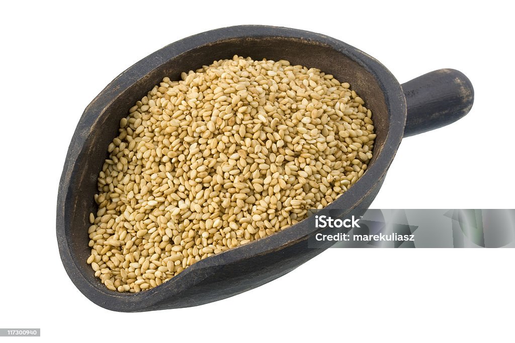 scoop di semi di sesamo - Foto stock royalty-free di Antico - Vecchio stile