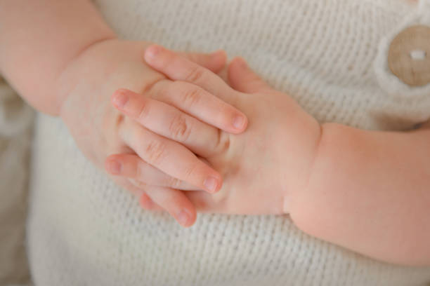 istock Hand of the newborn in a beautiful pose. 1173039788