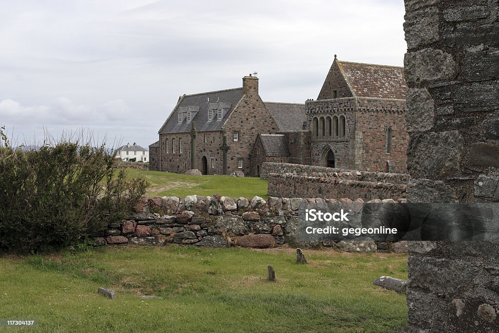 Iona Abbey View on Iona Abbey from Oran's Chapel on Island of Iona (Scotland, UK). There are visible the two celtic crosses of St. Martin and St. John.  Chapel Stock Photo