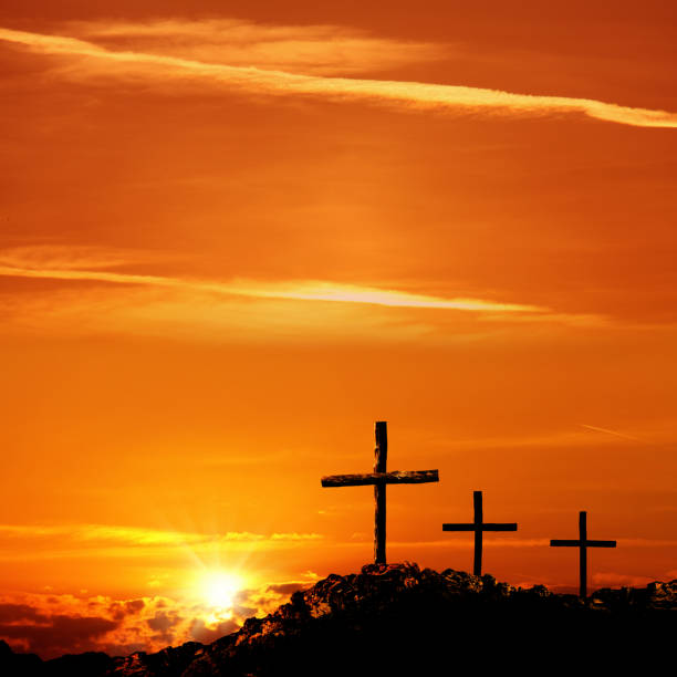 istock wooden cross on rocky hill 1173042154
