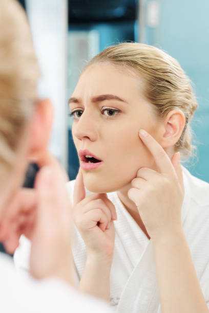 istock Woman noticing fist wrinkles 1173045466