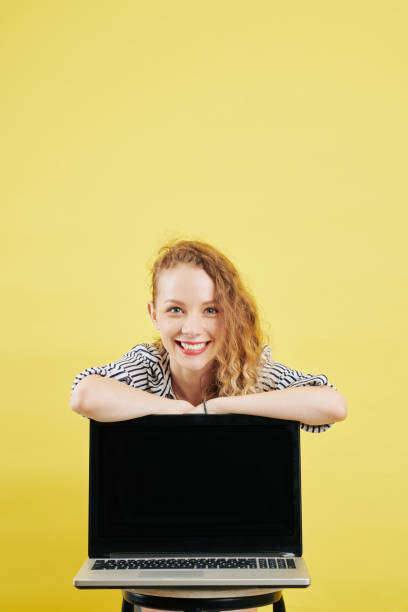 istock Female entrepreneur with opened laptop 1173045805