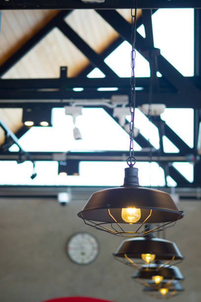 istock Modern lamps hanging on the ceiling. Coffee shop interior. 1173053882