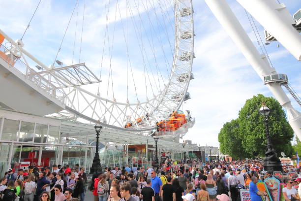London, United Kingdom - August 23, 2012: Westminster bridge near statue of Boadicea by Thomas Thornycroft with crowd of people