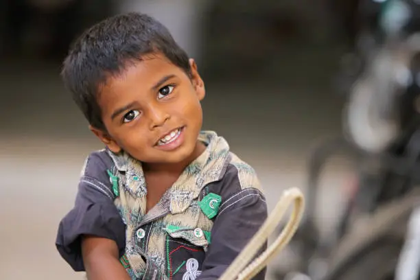 Photo of Portrait of Indian Little Boy Posing to Camera