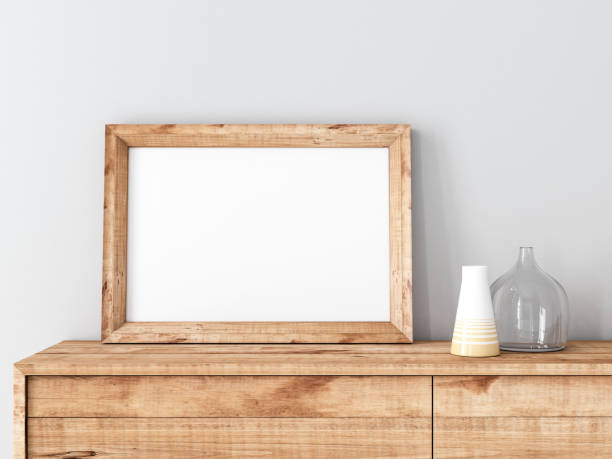 istock Horizontal Wooden Frame poster Mockup standing on bureau 1173064872