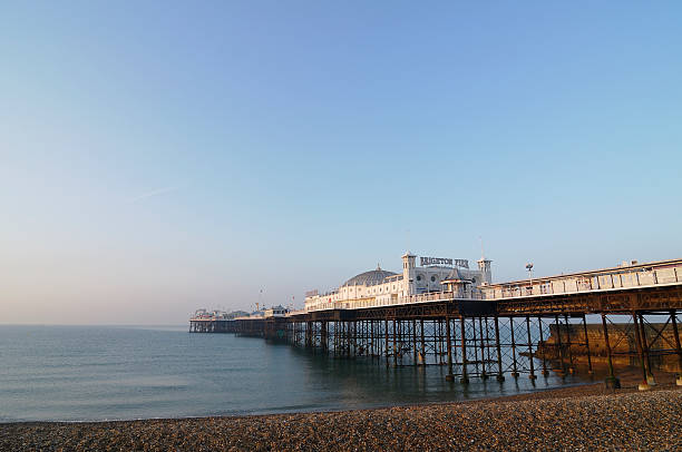 Brighton Pier Brighton Palace Pier in the morning sun light. east sussex photos stock pictures, royalty-free photos & images