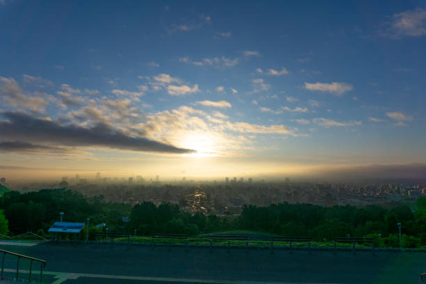 In the morning , I took this photo the rising sun from asahiyama memorial park.