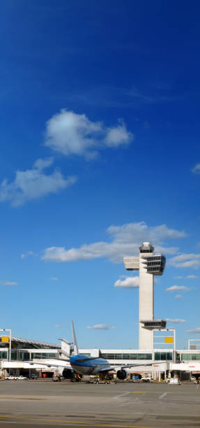 istock commercial passenger airplane at airport gate 1173073703