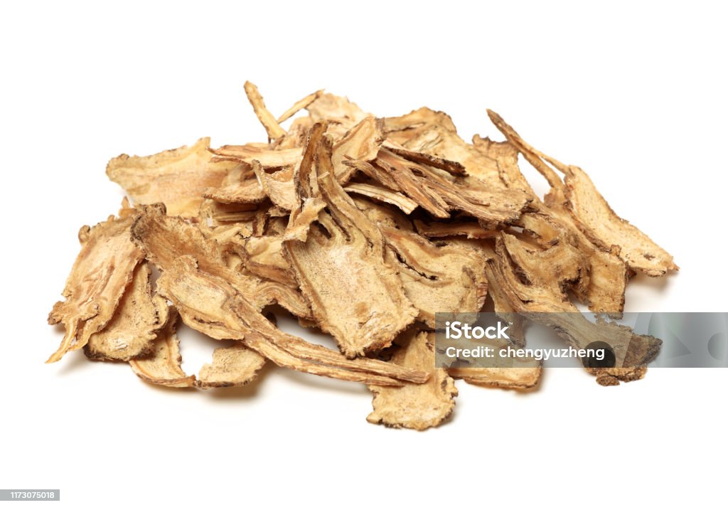 Sliced Angelica Sinensis or Dang Gui Sliced Angelica Sinensis or Dang Gui on white background Angelica Stock Photo