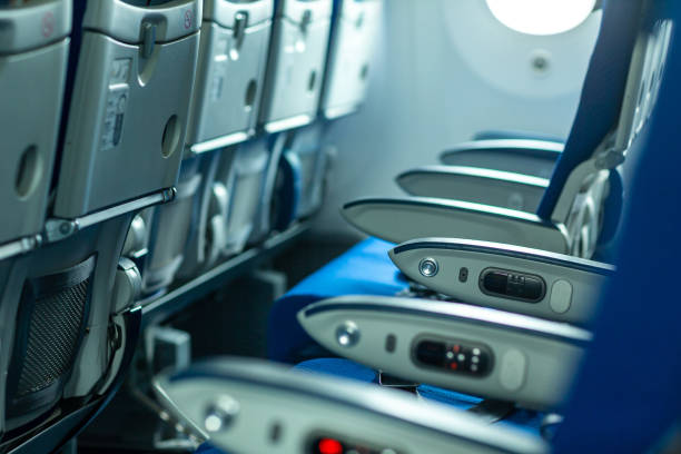 istock economy class seat in the airplane 1173077864