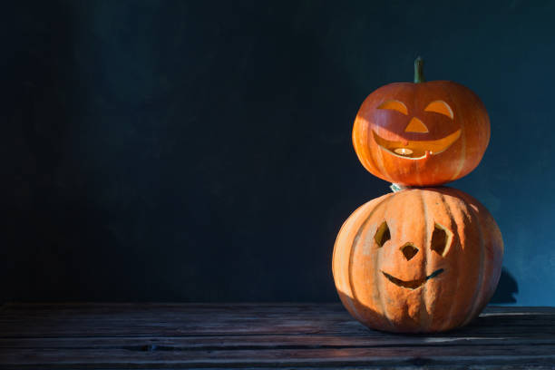istock Halloween pumpkin on dark background 1173082261