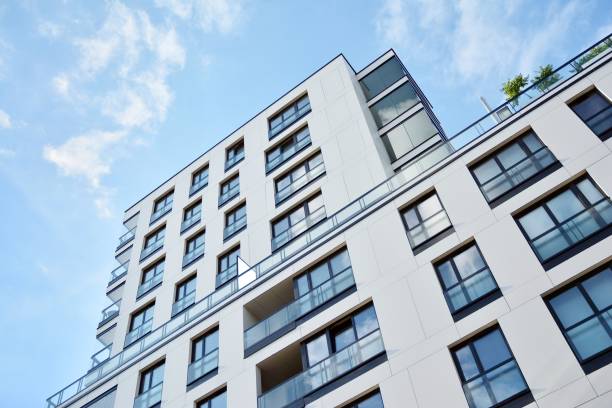 istock Modern apartment buildings on a sunny day with a blue sky. 1173082320