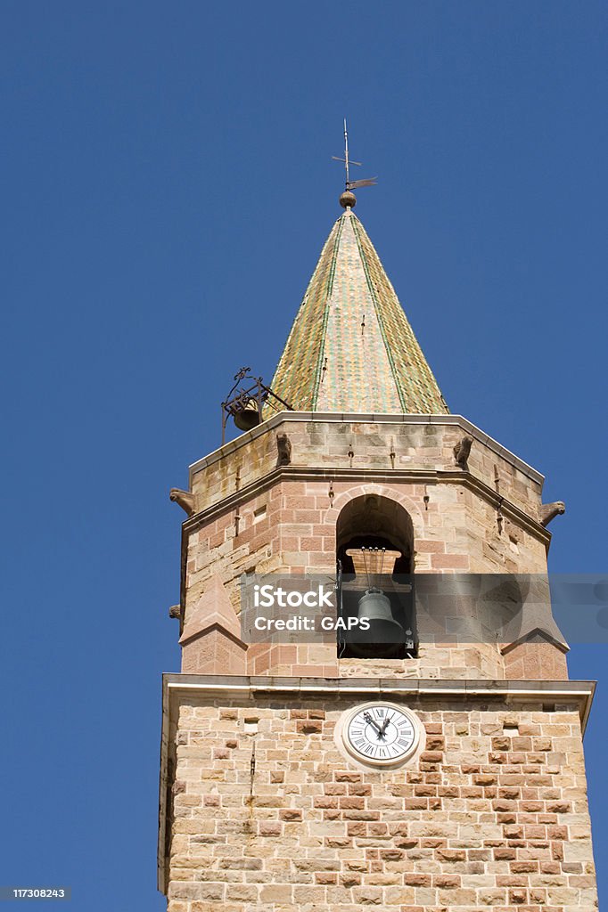 clock tower of the Saint-Léonce de Fréjus Cathedral top of the clock tower of the Saint-Léonce de Fréjus Cathedral; Fréjus, France Architecture Stock Photo