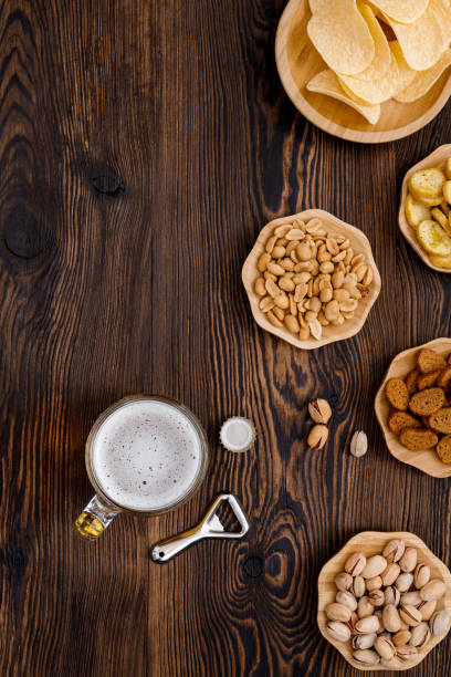 istock Beer glass with bottle cap and bottle 1173084475