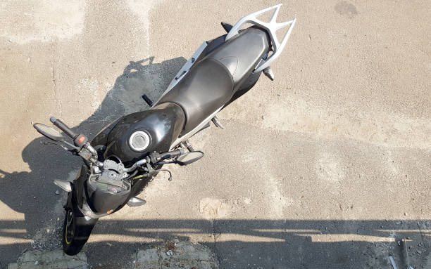 One black motorcycle parked top view. Parked motorcycle diagonally