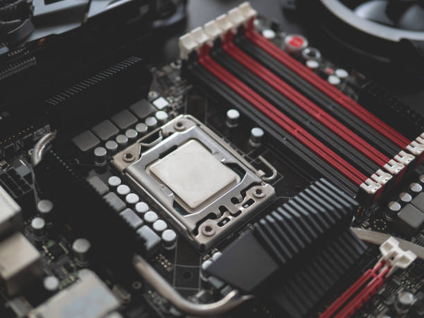 istock computer parts concept with CPU, Graphics card, and motherboard on black table background. 1173085897
