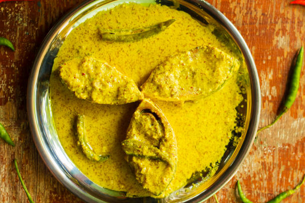 istock Ilish or Hilsa famous bengali fish curry with grinded mustard seed 1173089115