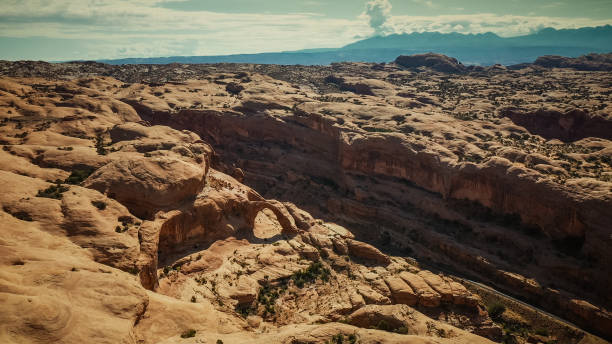 istock Drone over Corona and Bow Tie arch, Moab, Utah 1173090388
