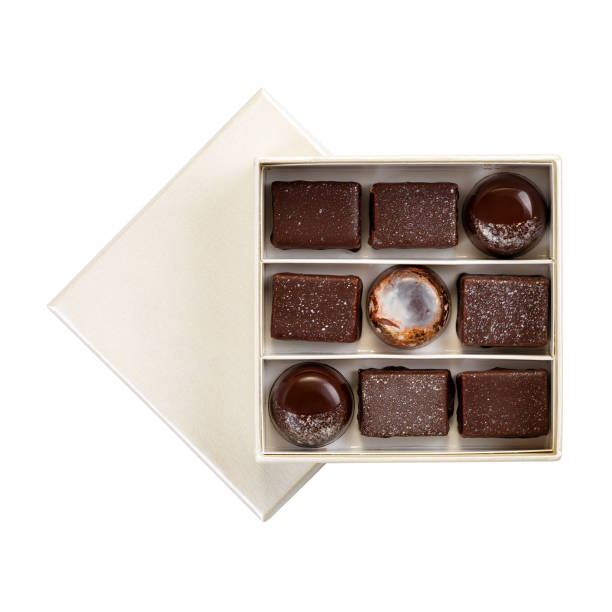 istock Chocolate candy set in white box isolated on white 1173094891