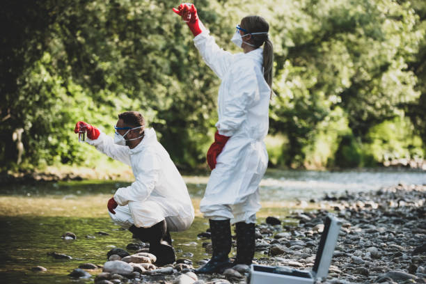 istock Biologist takes water from a forest river to study the composition in the laboratory 1173097184