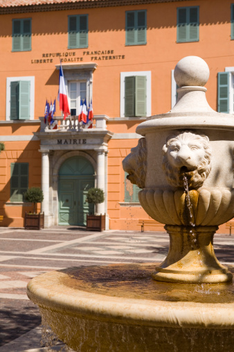 fountain in front of the town hall of Fréjus, that in former days served as a palace for the bishop; Fréjus, France