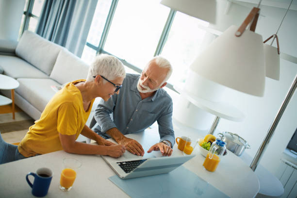 istock Mature couple buying some goods online 1173102511