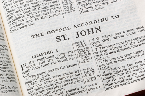 The Bible, open to the book of John.  This translation is King James, which is public domain.
