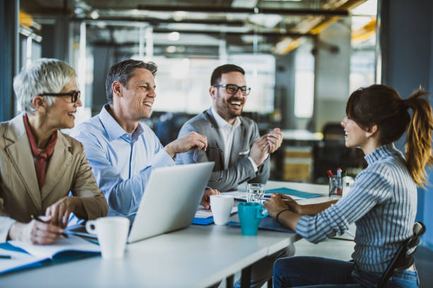 istock Happy human resource team talking to female candidate on a job interview. 1173104525