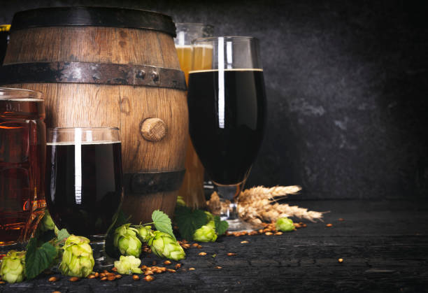 istock Beer Mug With Wheat And Hops With Barrel 1173108266