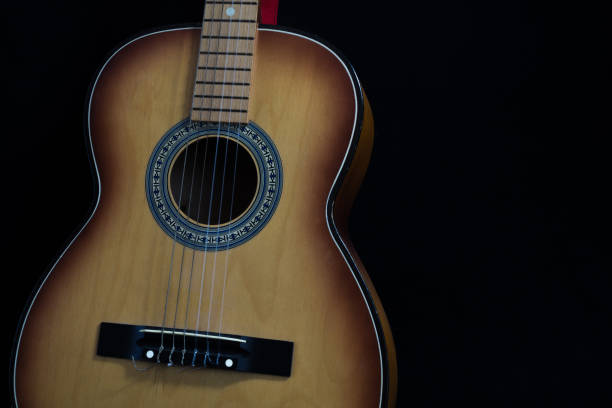 istock Green acoustic guitar. 1173109318