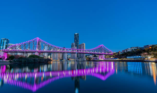 Reflection of story Bridge in Brisbane at dawn Story Bridge of Brisbane at dawn. Shoot from New farm river walk path under Wilson's lookout, with a good reflection from Brisbane river story bridge photos stock pictures, royalty-free photos & images
