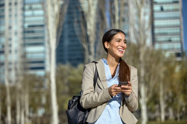 istock Cheerful female manager looking away in city 1173109712