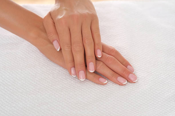 istock Beautiful, female hands with perfectly done manicure on studio shoot. 1173110778