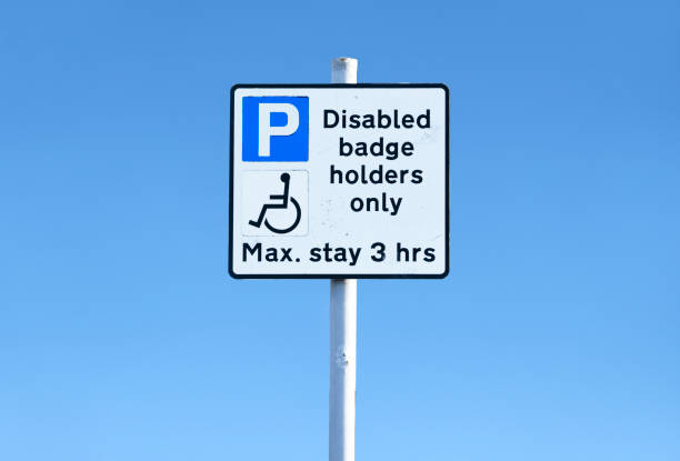 istock Disabled blue badge holders only max stay sign 1173112557