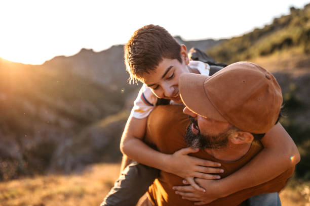 istock Piggyback in mountains is always great idea 1173113432
