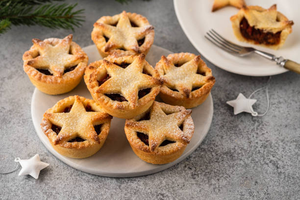 istock Delicious fruit mince tarts for Christmas dinner. Grey background, selective focus 1173113516