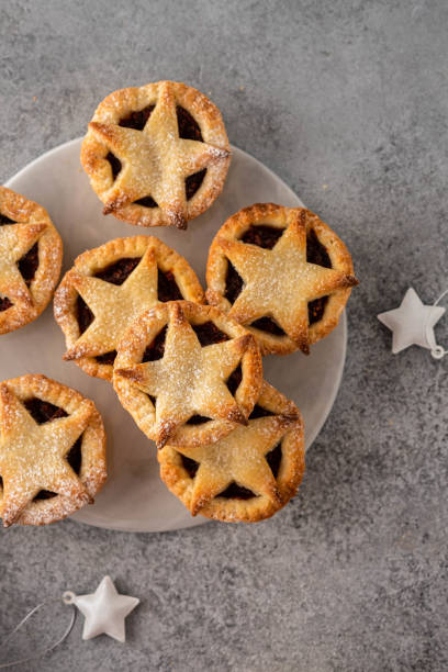 istock Delicious fruit mince tarts for Christmas dinner. Grey background, selective focus 1173113535