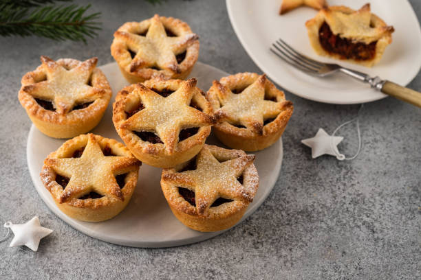 istock Delicious fruit mince tarts for Christmas dinner. Grey background, selective focus 1173113546