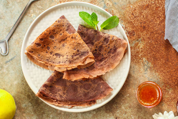 istock pancakes  chocolate (fritter with cocoa, delicious breakfast dessert) menu concept. food background. copy space. Top view 1173116025